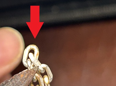 修理後の接続箇所を赤い矢印で示した確認写真