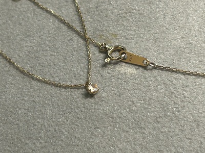 修理が完了し、輝きを取り戻したプチネックレス