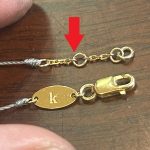 ロウ付けが完了し、シリコンポイントでピカピカに磨き上げられた美しいK18金具と無傷のナイロン紐